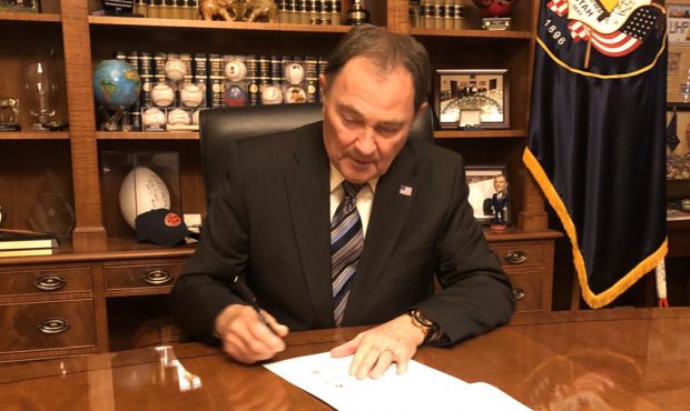 Utah Gov. Gary Herbert signs legislation repealing the state's controversial tax reform bill passed...
