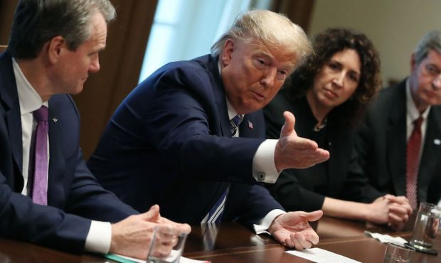 U.S. President Donald Trump speaks during a meeting with CEOs of major banks to discuss the coronav...