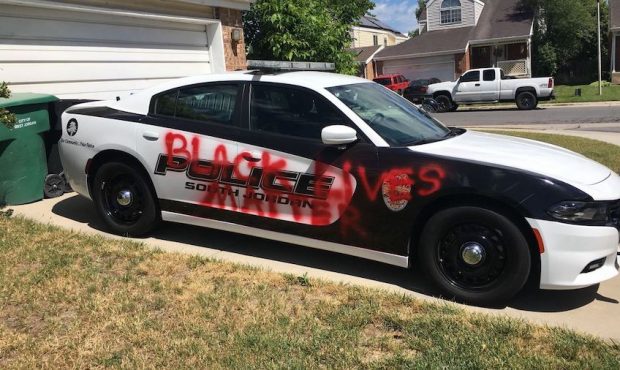 "Black Lives Matter" was spray-painted on a South Jordan police officer's vehicle....
