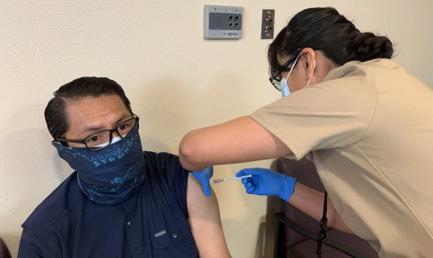 Navajo Nation President Jonathan Nez receives a dose of the Pfizer COVID-19 vaccine on December 31,...
