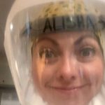 Alisha Barker smiles inside her powered air-purifying respirator in the COVID-19 ICU which can be a stressful and heart-wrenching place, (KSL TV)