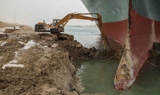 Suez Canal authorities need to remove 20,000 cubic meters of sand to free the Ever Given. This imag...