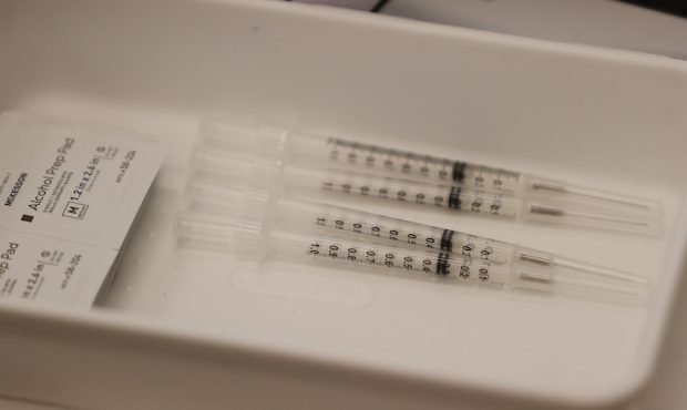 FILE: Pfizer-BioNtech COVID-19 vaccines are  prepared at the Jackson Memorial Hospital on April 15,...