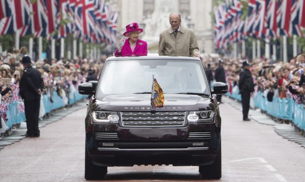 FILE: Queen Elizabeth II and Prince Philip, Duke of Edinburgh wave to guests attending "The Patron'...