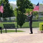 Erik Whicker plays "Taps" at the Herriman Cemetery on Memorial Day. (Jed Boal/KSL TV)