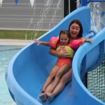 Stacey Jensen took her five-year-old daughter, Savannah, down the slide at the Draper Recreation Center. (Ken Fall, KSL TV)