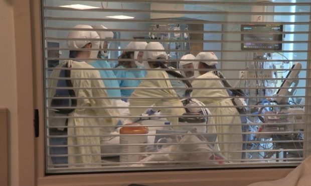 A medical team moves a COVID-19 patient in a Utah hospital. (KSL TV)...