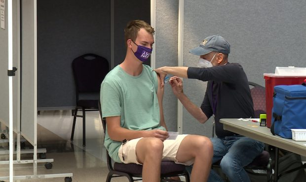 A Weber State University student receives his COVID-19 vaccine in August, 2021. (KSL TV)...