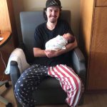 Jordan Mair holds his newborn baby, Greyson Mair, in the hospital. Just two months after Greyson was born, Jordan took his own life. He had struggled with depression for years but resisted medication and therapy. (Summer Smart)