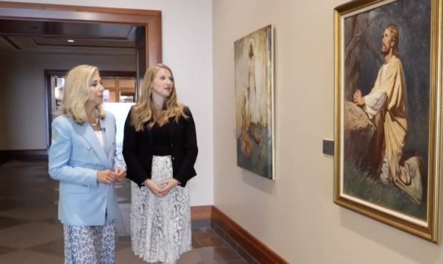 KSL's Carole Mikita and Laura Paulsen Howe, director of the Church Museum of History and Art, admir...