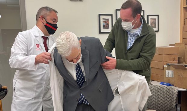 Eberhard Lehnardt, age 85, puts on his white coat as part of his honorary acceptance. (KSL TV)...