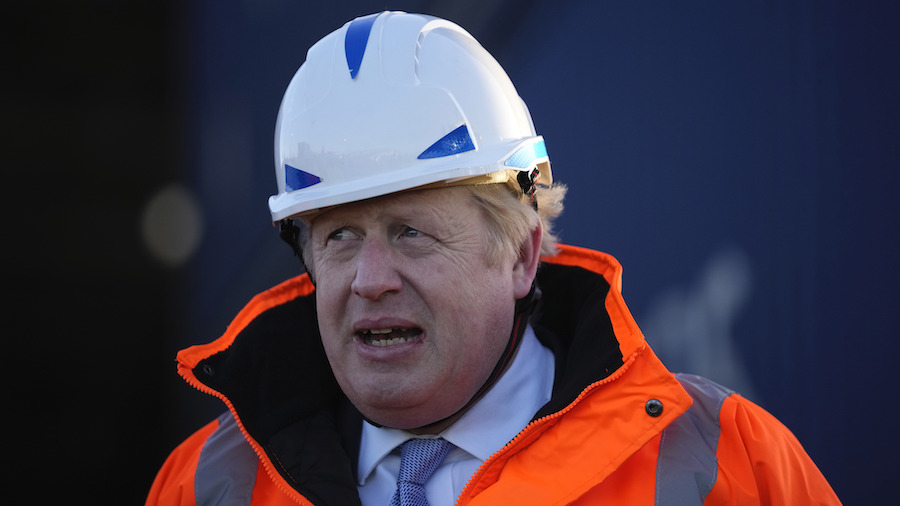 British Prime Minister Boris Johnson looks on during a visit to Tilbury Docks on January 31, 2022 i...
