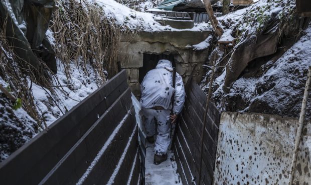 Mykola, a Ukrainian soldier with the 56th Brigade, in a trench on the front line on January 18, 202...