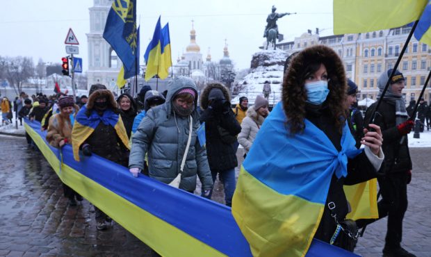 KYIV, UKRAINE - JANUARY 22: People rallying in patriotic support of Ukraine walk with a 500 meter l...