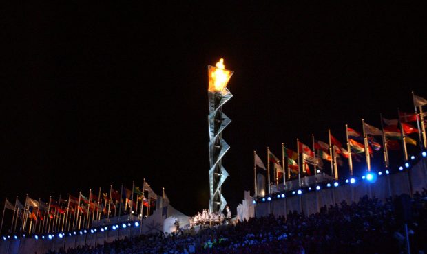 400804 40: (NEWSWEEK, US NEWS, MACLEANS AND GERMANY OUT) The Olympic flame burns at the Opening Cer...