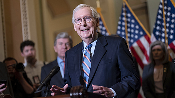 FILE - Senate Minority Leader Mitch McConnell, R-Ky., speaks with reporters following a closed-door...