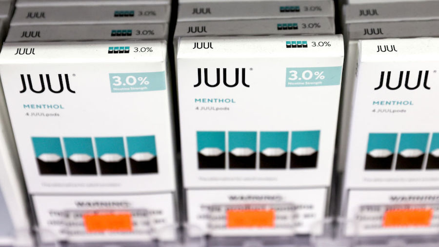 Packages of Juul e-cigarettes are displayed for sale in the Brazil Outlet shop on June 22, 2022 in ...