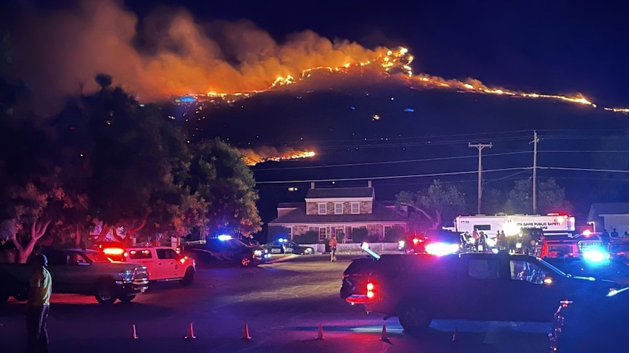 The Deuel Creek Fire burns in the foothills near Centerville Monday morning. (John Wilson/KSL TV)...