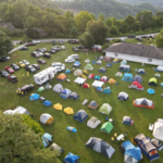 A drone image captures tents at a command center in eastern Kentucky on Aug. 20, 2022. Members of seven surrounding stakes camped in Martin and Hazard, Kentucky, for two weekends in a row while helping clean up flooded homes. | (The Church of Jesus Christ of Latter-day Saints)