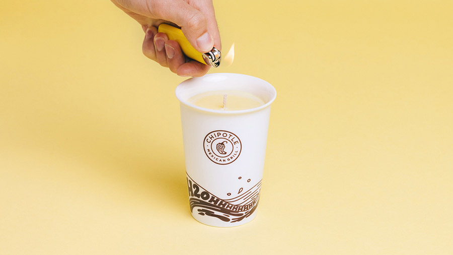 Chipotle's new lemonade-scented soy candle is designed to look like a Chipotle water cup. Some Chip...