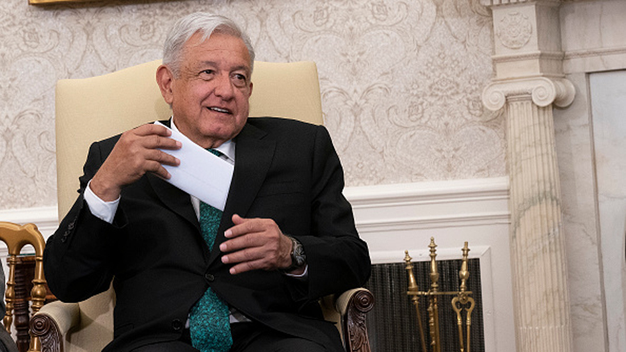 WASHINGTON, DC - JULY 12: Mexican President Andres Manuel Lopez Obrador pulls out his remarks while...