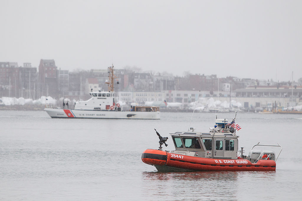 FILE BOSTON, MA - JANUARY 6:  U.S. Coast Guard boats patrol Boston Harbor outside of the Moakley Fe...