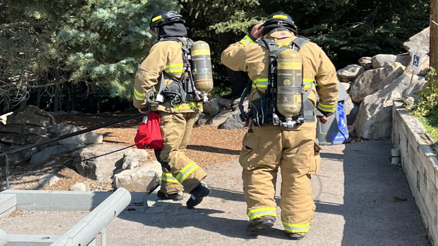 Firefighters from the North Fork Fire Department walked up 343 steps loaded in their full gear at t...