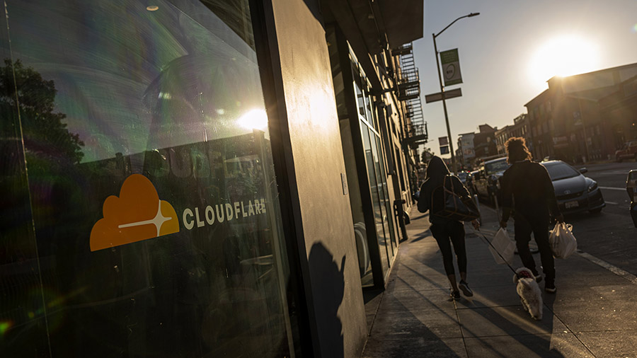 Pedestrians outside the Cloudflare headquarters in San Francisco, California, U.S., on Tuesday, Feb...