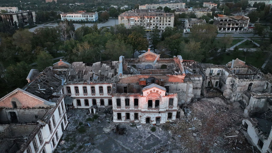 Destruction of various buildings is seen from an aerial perspective on September 21, 2022 in Izium,...
