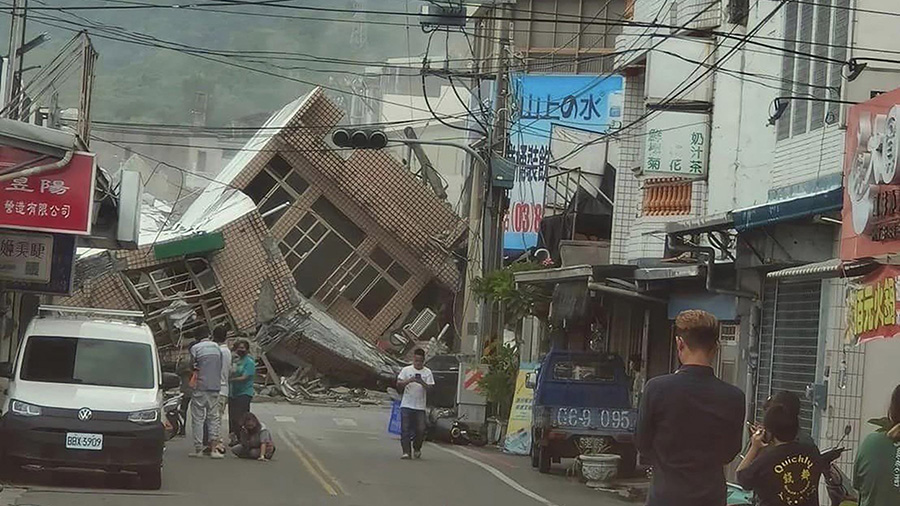 This image shows a collapsed building in southern Taiwan following a powerful  earthquake on Sunday...