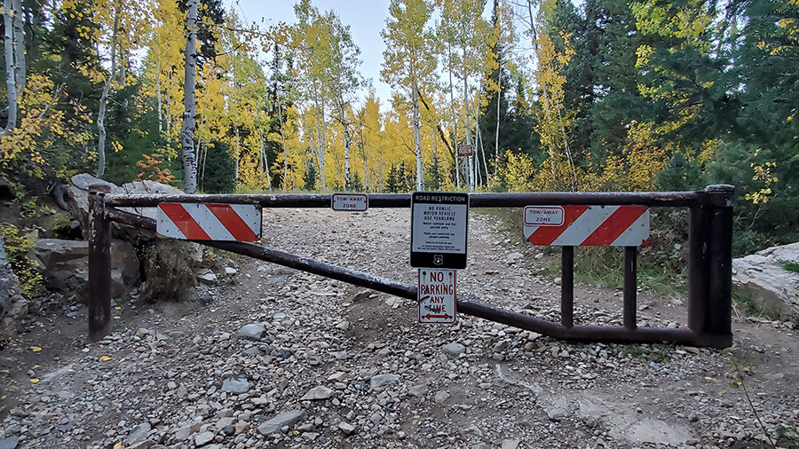 A closed gate from Utah wilderness officials to prevent people from accessing the trail....