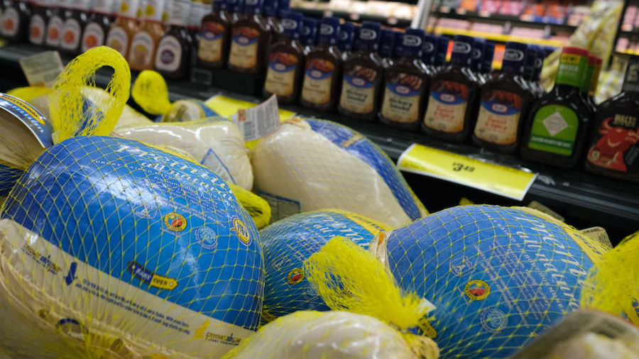 Frozen turkeys are displayed for sale inside a grocery store on November 14, 2022 in New York City....