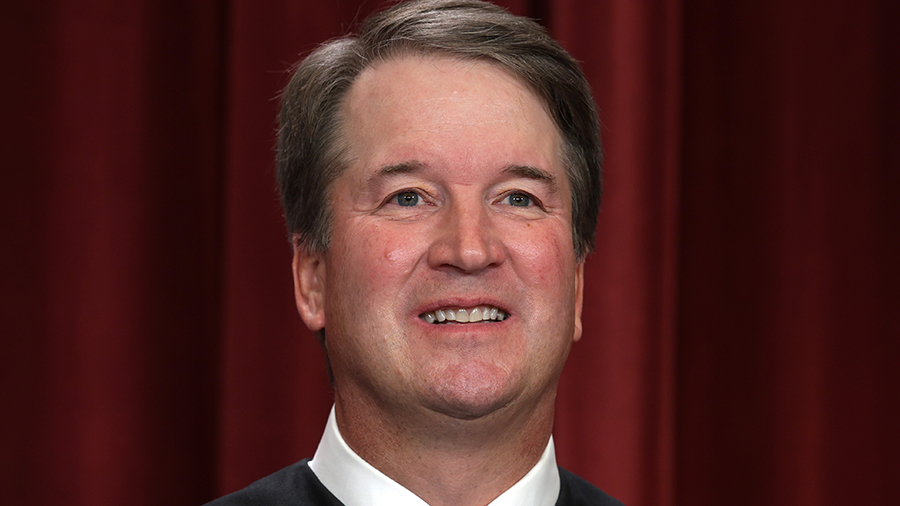 United States Supreme Court Associate Justice Brett Kavanaugh poses for an official portrait at the...