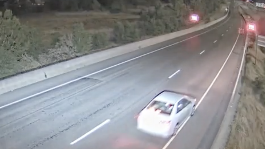 This still from a UDOT video shows the new wrong way signs lighting up as a test vehicle drives the...
