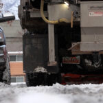 Plows had a tough time maneuvering between cars in West Jordan, Utah. (Lauren Steinbrecher/KSL TV)