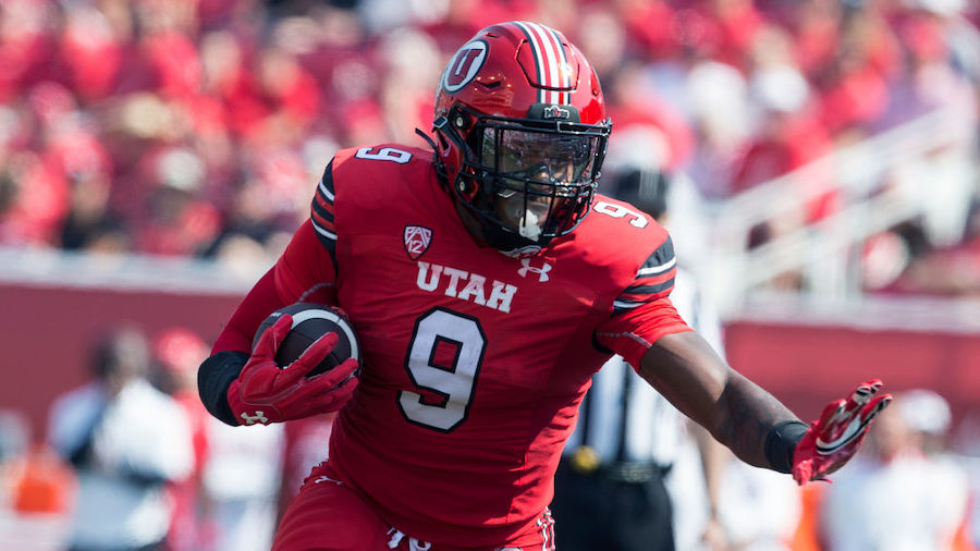 Tavion Thomas #9  of the Utah Utes rushes the ball against the Southern Utah Thunderbirds during th...