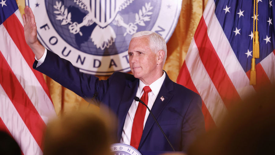 Former U.S. Vice President Mike Pence waves after delivering closing remarks at the Nixon National ...