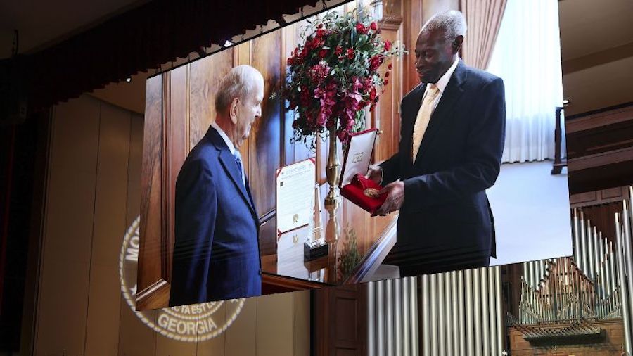 President Russell M. Nelson receives the Gandi-King-Mandela Peace Prize from Dr. Lawrence Edward Ca...