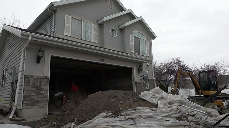 Bryan Bradbury's home being repaired because of the sinking effecting his home. (KSLTV)...
