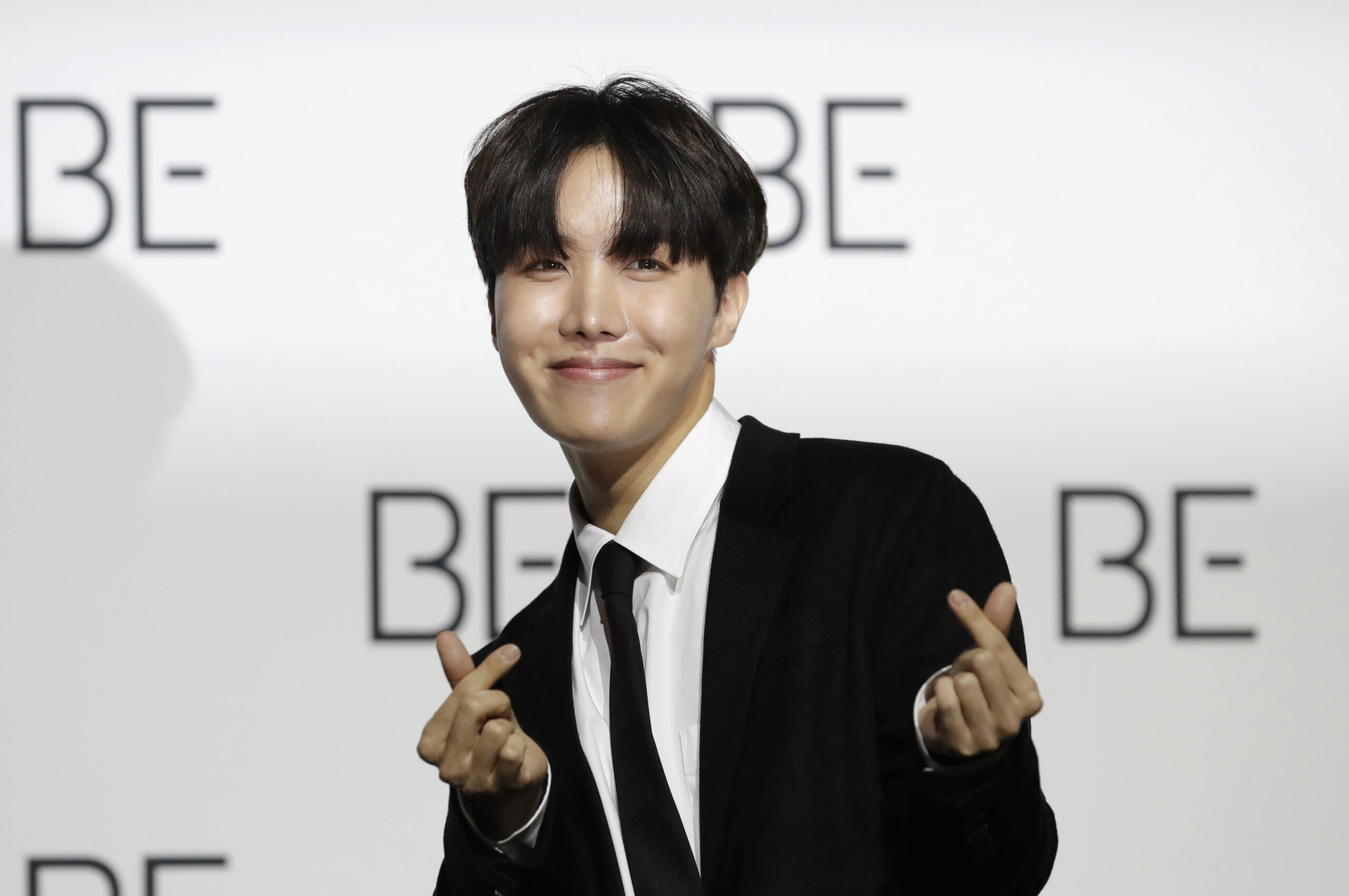 FILE - A member of South Korean K-pop band BTS J-Hope poses for photographers during a press confer...