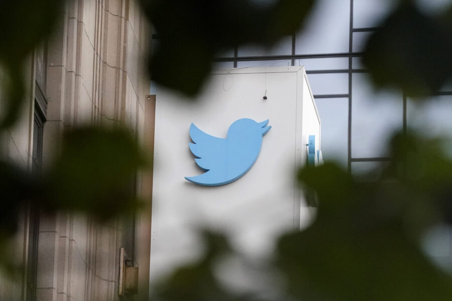 FILE - A sign at Twitter headquarters is shown in San Francisco, Dec. 8, 2022. Twitter has quietly ...
