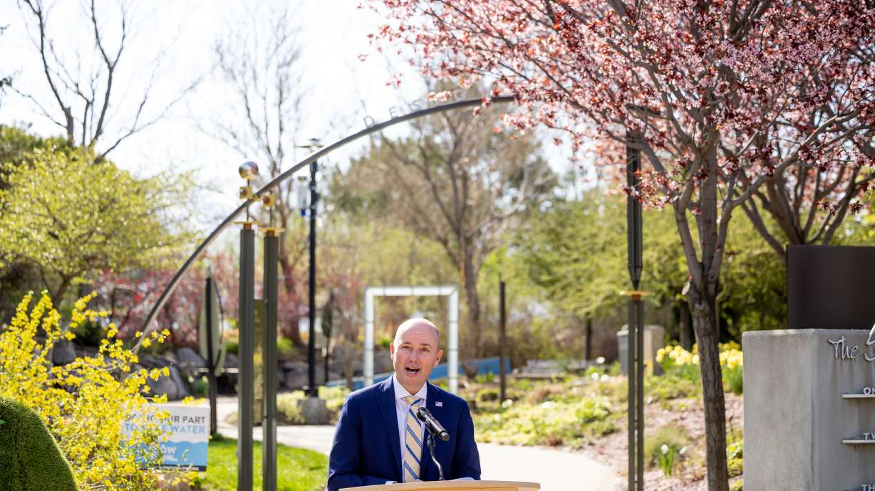 Gov. Spencer Cox speaks during a press conference at the Jordan Valley Water Conservancy District's...