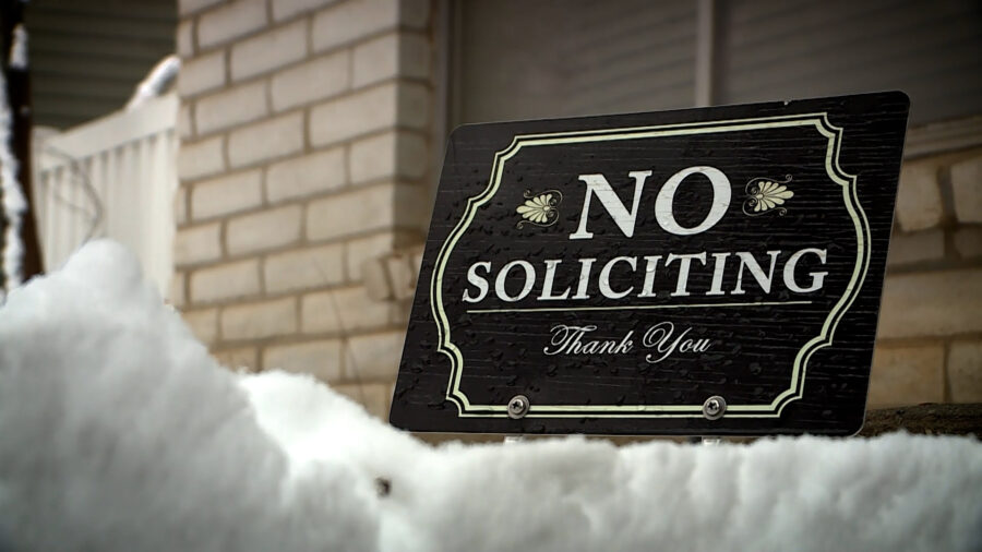 Matt Luers says the "No Soliciting" sign at his Sandy home is hard to miss, but solicitors continue...
