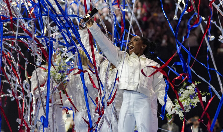 FILE - Simone Biles and the U.S. women celebrate as the 2024 team is named at the United States Gym...